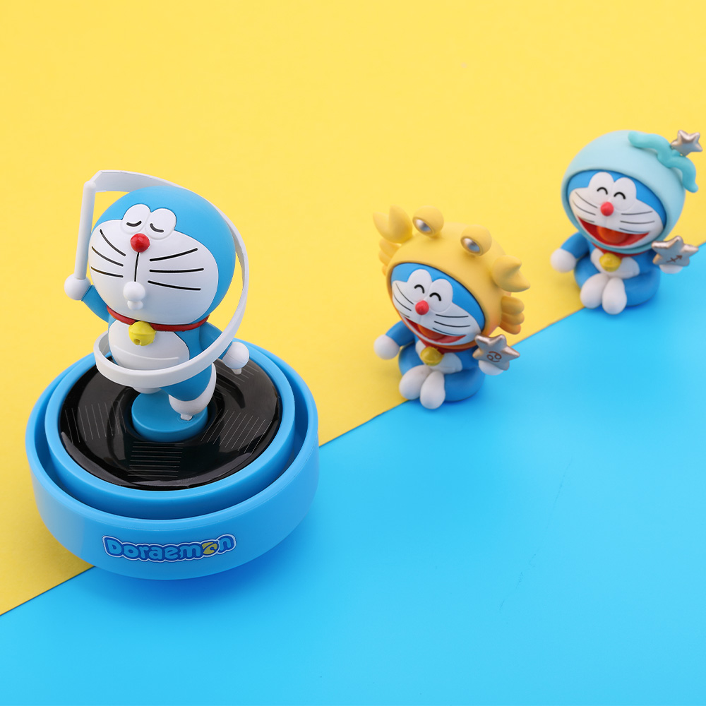 REGO Communication Sdn Bhd - Rock Space | ROCK Doraemon Solar-Powered Rotating Car Aroma Ornament